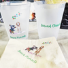 Two plastic cups and a napkin with 'Second Chance' text and illustrations on a surface.